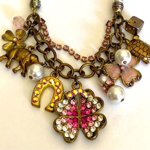 Betsy Johnson pearl and charms Lucky necklace 16” long.